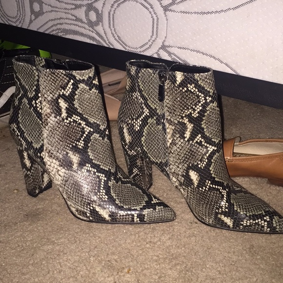 ‘RAELLE’ Mint Snake Print pointed toe bootie.